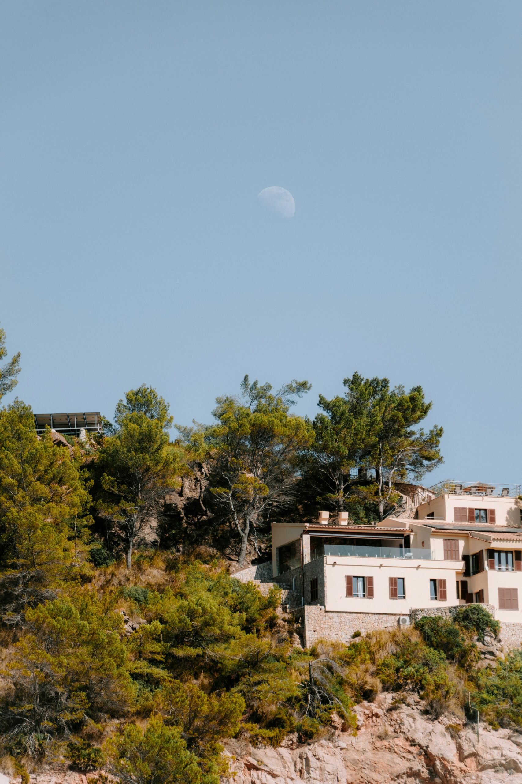 Houses set into the hillside above the Algarve coast